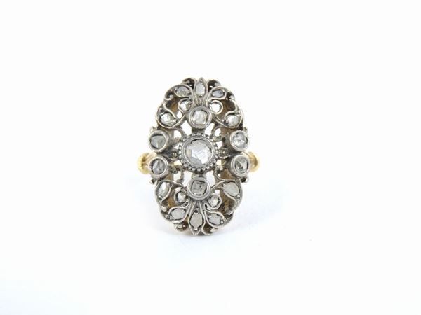 Yellow gold and silver ring with diamonds