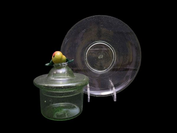 Composter and plate in light green blown glass with lid decorated with polychrome fruit.  (Murano, 20th century)  - Auction Furniture and Paintings from the Ancient Fattoria Franceschini, partly from Villa I Pitti - Maison Bibelot - Casa d'Aste Firenze - Milano
