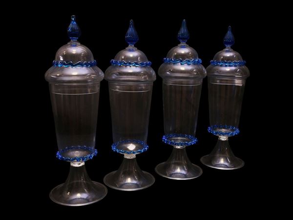 Four colourless blown glass potiches with lid decorated with blue filaments.  (Murano, 20th century)  - Auction Furniture and Paintings from the Ancient Fattoria Franceschini, partly from Villa I Pitti - Maison Bibelot - Casa d'Aste Firenze - Milano