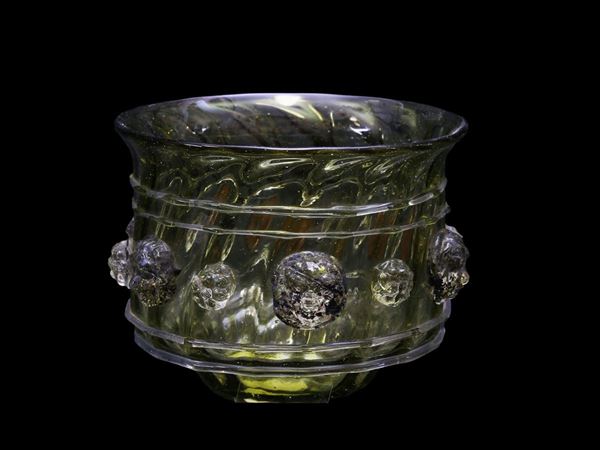 Small blown glass bowl with hot applied morise and lions applications.