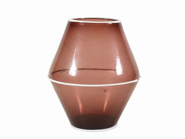 An amethist-coloured blown glass vase with milky glass applications. Defects