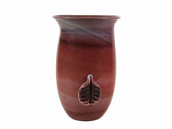 A chalcedony glass vase with hot application of lateral leaves
