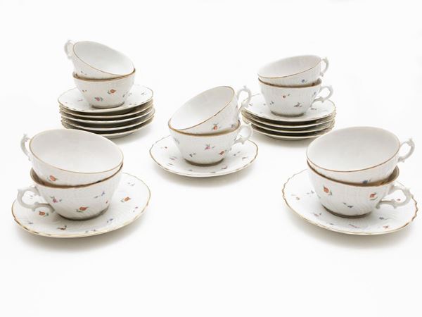 Serie di dodici tazze da tè in porcellana Ginori