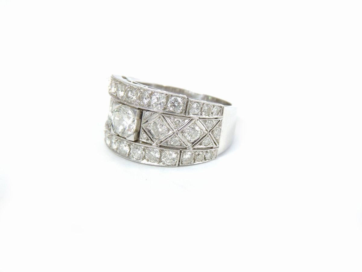 Anello a Fascia in Oro Bianco con Diamanti
