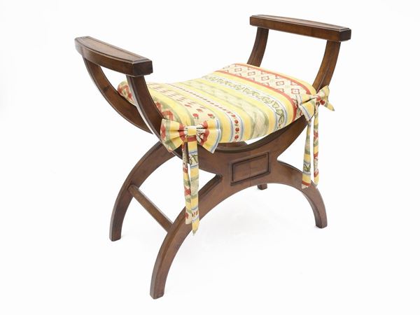 A walnut faldistorium stool