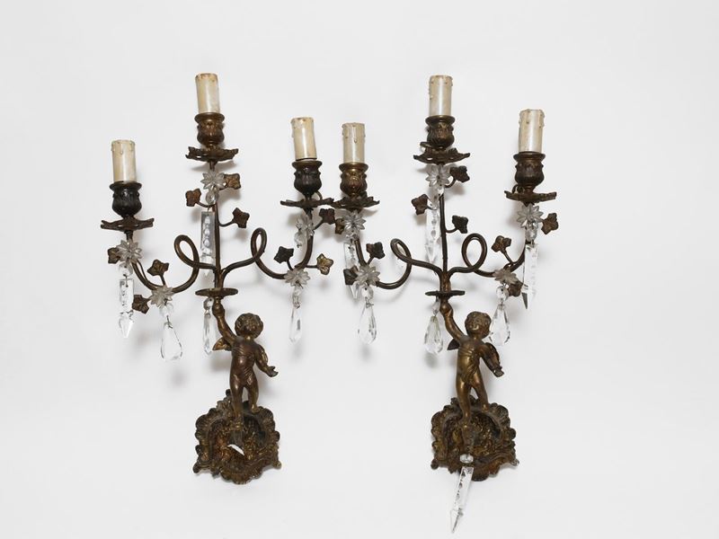 Serie di Quattro Appliques in Metallo
