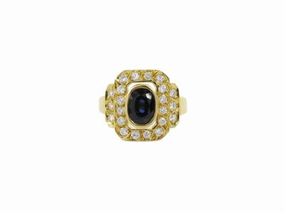 Anello in Oro Giallo con Diamanti e Zaffiro