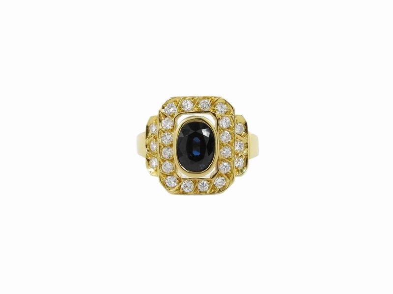 Anello in Oro Giallo con Diamanti e Zaffiro