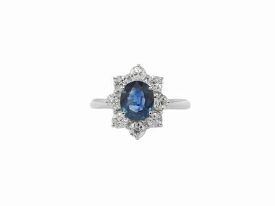 Anello in Oro Bianco con Diamanti e Zaffiro