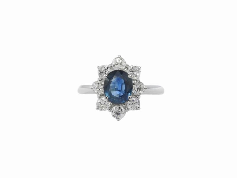 Anello in Oro Bianco con Diamanti e Zaffiro