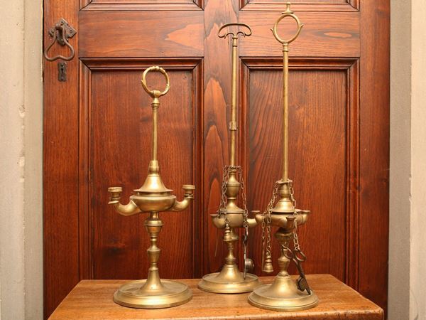 A lot of three bronze florentine oil lamps
