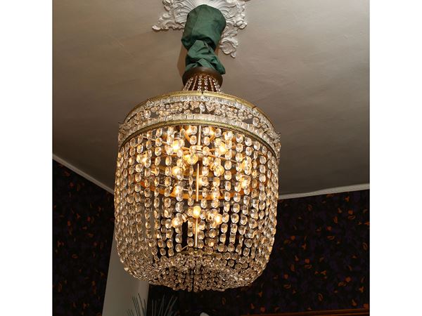 A large crystal and gilted metal chandelier