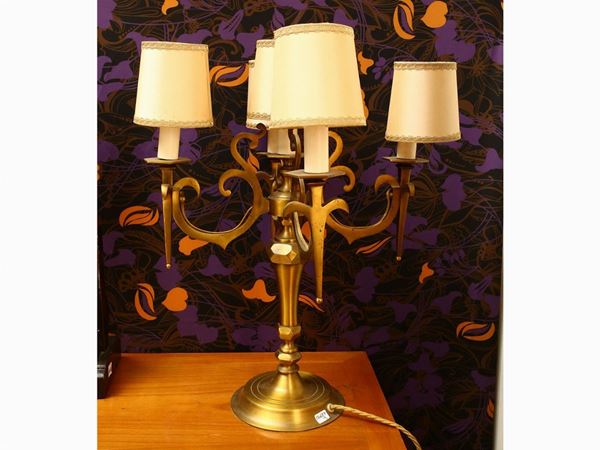 A pair of brass table lamps