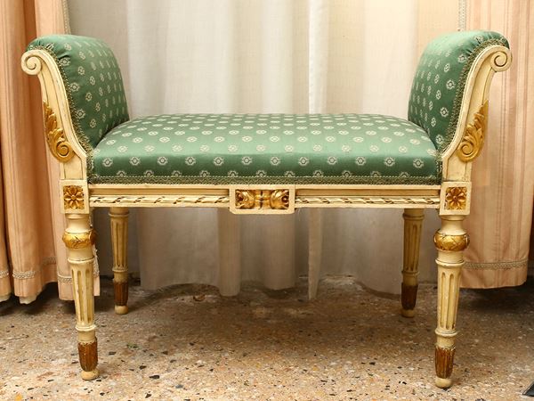 A pair of laquered giltwood stolls