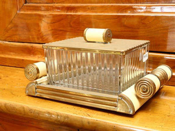 A glass, metal and lacquered wood butter or cheese dish