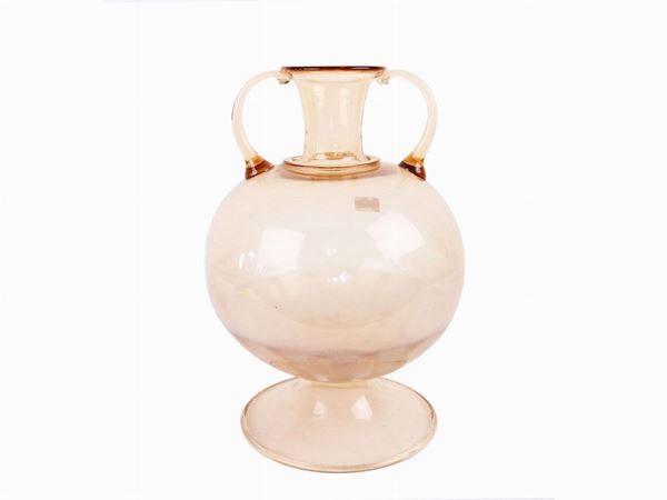 Salmon-colored glass vase