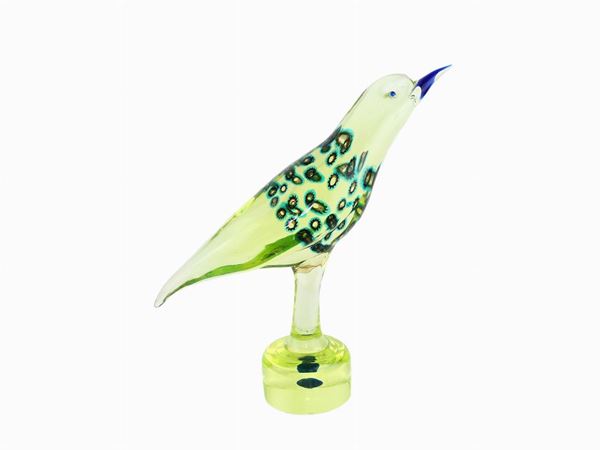 Thick glass figure with murrine inclusions on the mantle