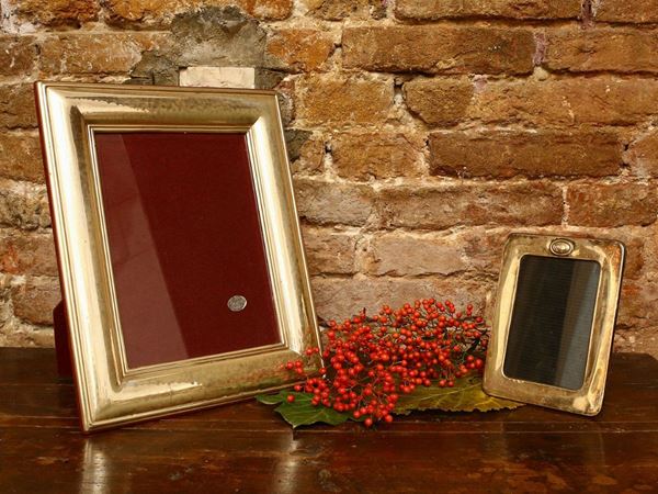 Two silver covered photo frames