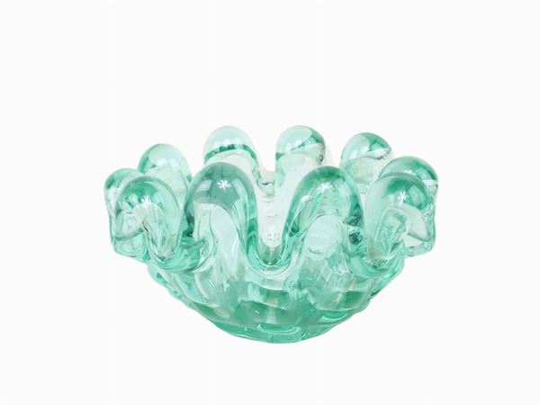 Shell-shaped ashtray in iridescent green glass