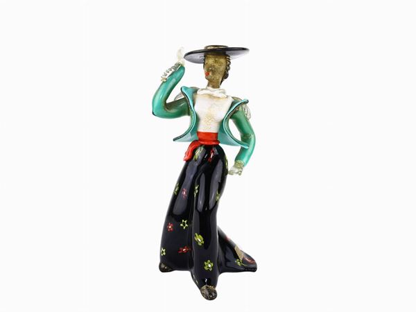 Figure of Spagnola with Cenedese hat and C in colored glass paste