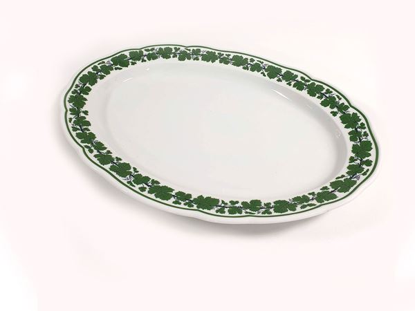 Oval Meissen tray in white porcelain with vine leaf decoration on the edge. Marked.