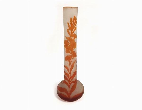 A gallé vase in cameo glass with decoration of flowers and leaves on a shaped opal background.Signed
