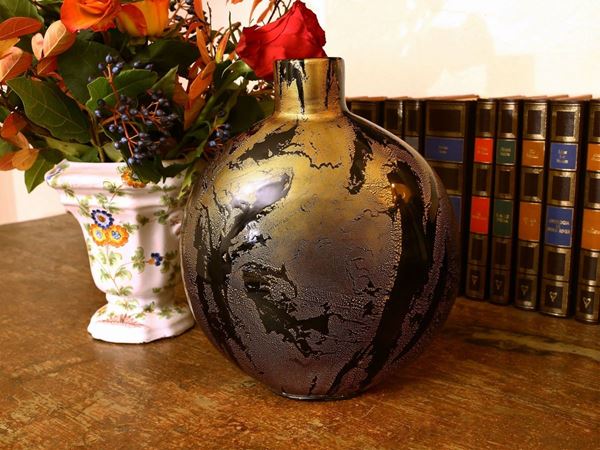 Murano vase in black glass with gold leaf. Signed.