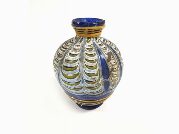 A blue glass vase with phoenician decoration, so called excavation.  (Murano, 1980)  - Auction Furniture and Paintings from a villa in Fiesole (FI) - Maison Bibelot - Casa d'Aste Firenze - Milano