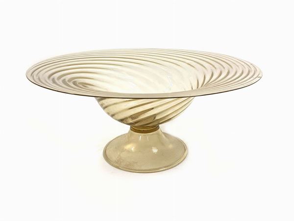 A Cappelin stand in amber-coloured twisted rigadin glass.  (Murano, 1925)  - Auction Furniture and Paintings from a villa in Fiesole (FI) - Maison Bibelot - Casa d'Aste Firenze - Milano