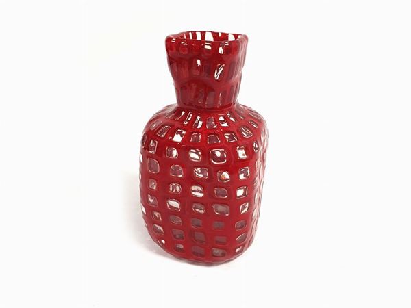 A Venini vase "Occhi" series with colourless and red murrine. Signed Venini Murano Italia.