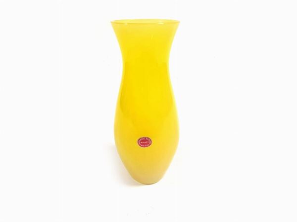 An Archimede Seguso vase in yellow opaline glass with original label.