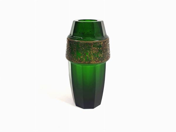 Moser vase in ground green glass with golden band in relief with a classic subject. Signed.