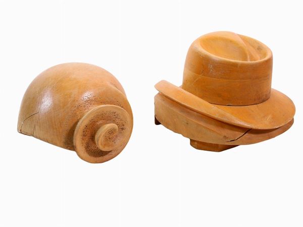 Two soft wood hat molds