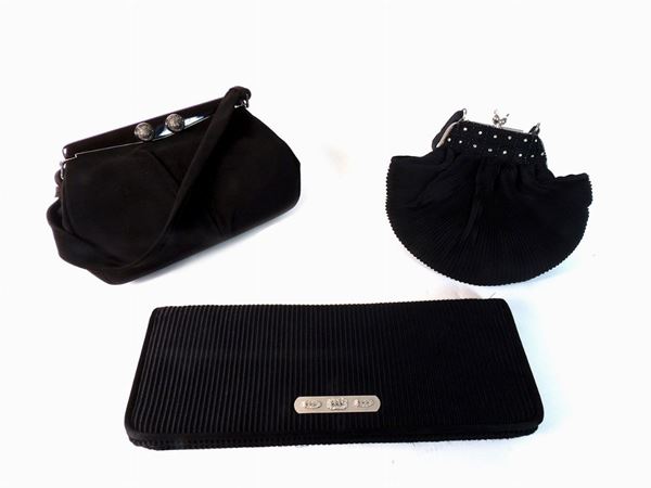 Three black fabric and chamois evening handbags