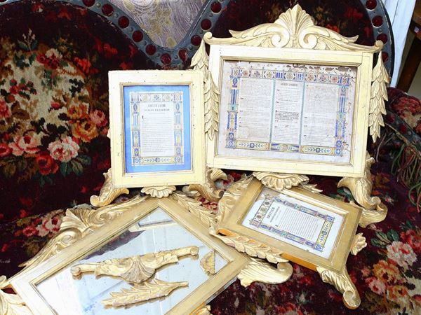 Series of four cartaglorias with carved and gilded wooden frame