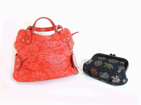 Two red leather and black fabric handbags, Braccialini