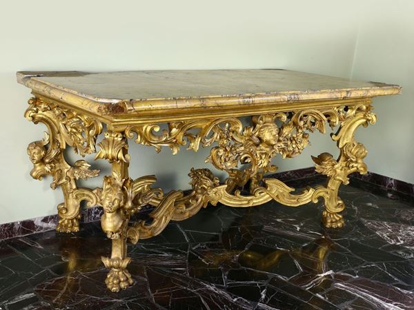 A gilded wood console