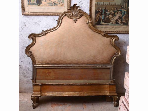 Pair of carved and gilded wood single beds