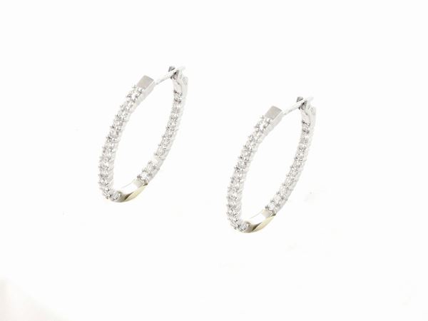 White gold pendent earrings with diamonds