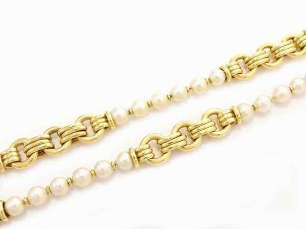 Lunga collana in oro giallo con perle coltivate Akoya