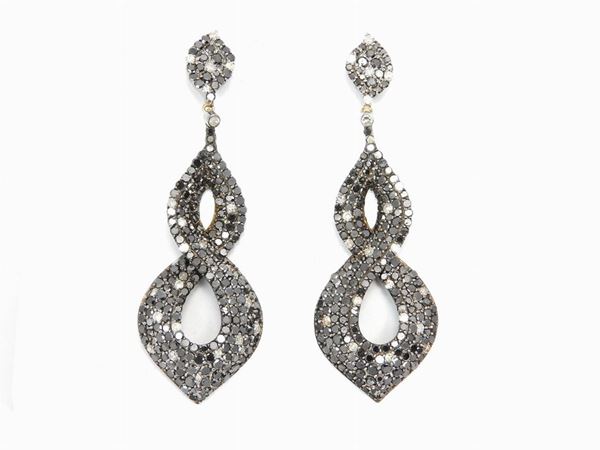 14Kt burnished gold earrings with colorless and black diamonds