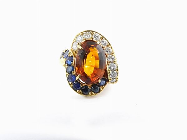 Yellow gold ring with diamonds, sapphires and citrine quartz