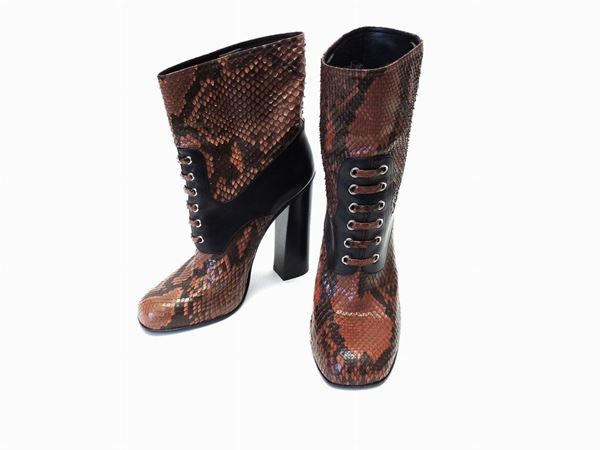 Brown python and leather pair of ankle boots, Gucci