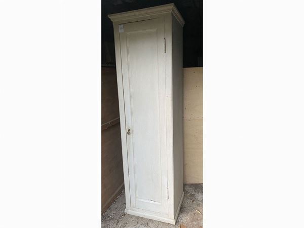 Column cabinet in soft white lacquered wood