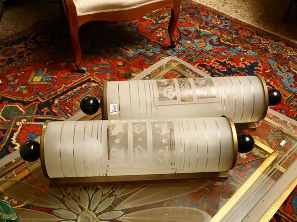 Pair of cylinder wall lights in colorless blown glass