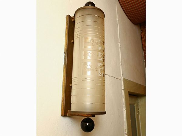 Pair of cylinder wall lights in colorless blown glass