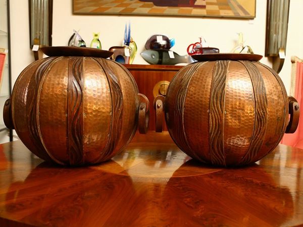 Pair of large spherical vases in copper and oak