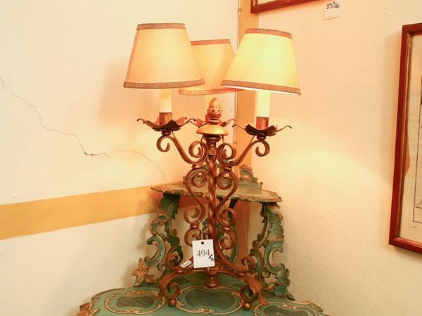Pair of table lamps in gilded wrought iron