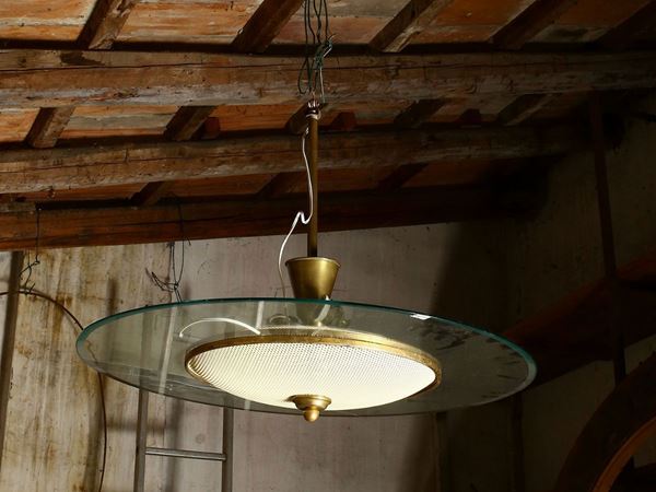 Disc chandelier in crystal and brass