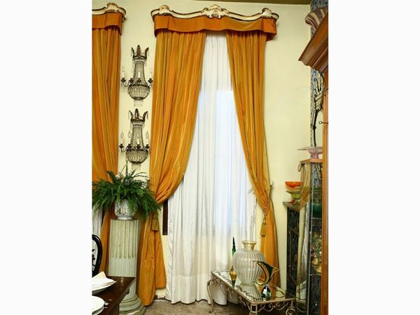 Curtain in iridescent orange-gold silk
